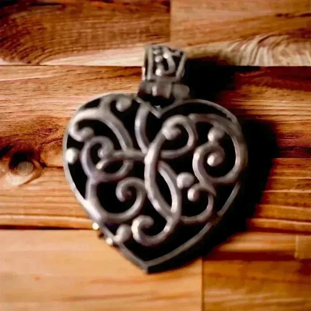 Vintage sterling heart reversible pendant